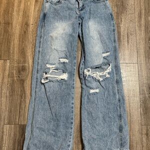 Women's Distressed Blue Jeans